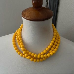 Triple strand yellow beaded statement necklace